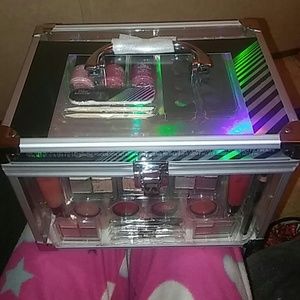 NWT. 61 piece makeup set with carry case.